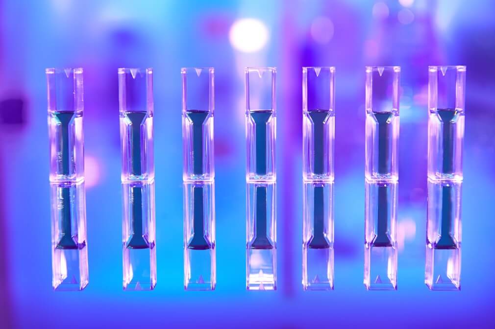 scientific-background-in-vibrant-neon-colors-purple-blue-and-turquoise-pharma-biotech-protein_t20_xRoA7Q (1)